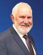 A picture containing person, person, suit, wearing

Description automatically generated