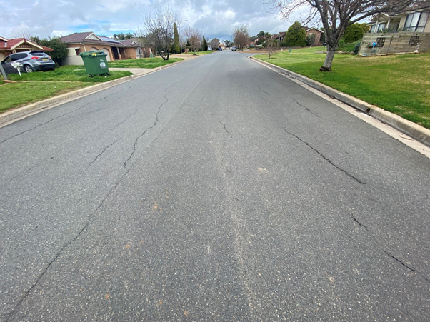 A picture containing road, outdoor, grass, sky

Description automatically generated